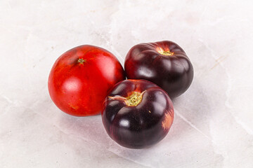 Black ripe juicy organic tomato