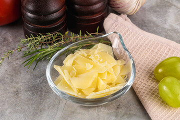 Parmesan cheese slices in the bowl