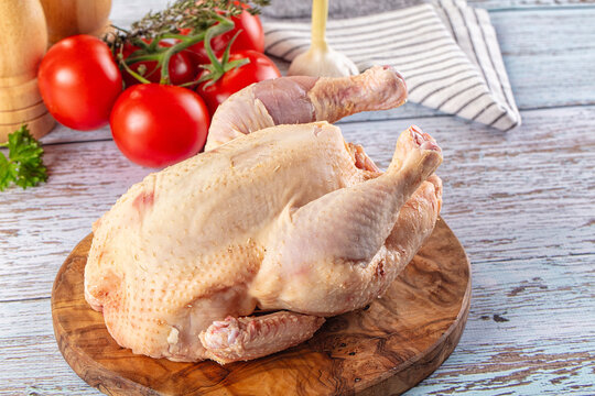 Raw whole uncooked organic chicken