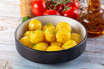 Boiled young potato with oil