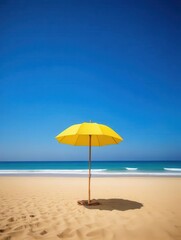 solitary yellow umbrella on pristine beach under clear blue sky during sunny day