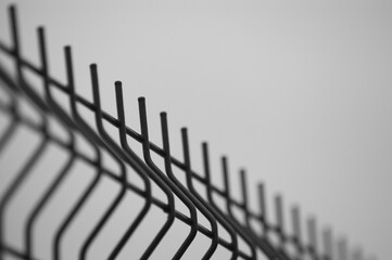 3d metal mesh on grey background