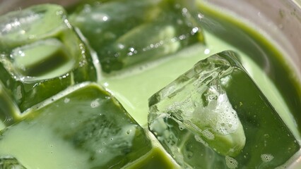 Iced Matcha Latte. Closed Up.