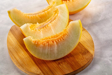 Ripe sweet juicy melon with slices