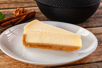 Classic delicous cheesecake slice served mint