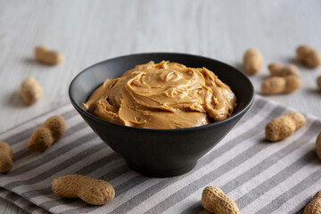 Organic Creamy Peanut Butter in a Bowl, low angle view.