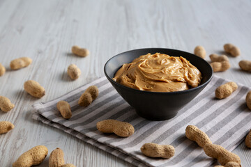 Organic Creamy Peanut Butter in a Bowl, low angle view.