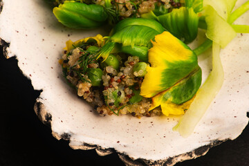 Stuffed Green Parrot Tulips with Quinoa, Peas and Honey on Handmade Ceramic Plate