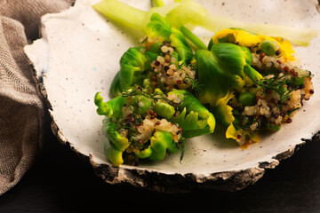 Stuffed Green Parrot Tulips with Quinoa, Peas and Honey on Handmade Ceramic Plate