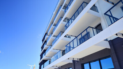 Modern architecture of urban residential apartment building. Apartment building exterior, residential house facade.