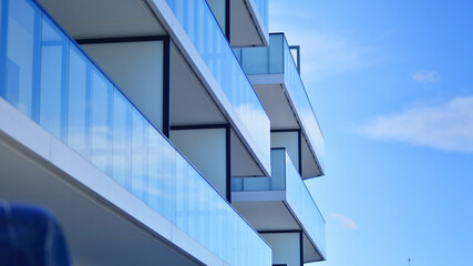 Obraz premium Modern architecture of urban residential apartment building. Apartment building exterior, residential house facade.