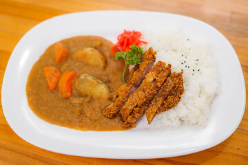 Japanese katsu curry with rice and vegetables

