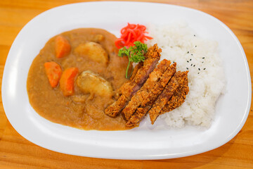 Japanese katsu curry with rice and vegetables
