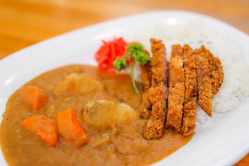 Japanese katsu curry with rice and vegetables
