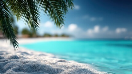 Tropical beach with palm leaves and blurred sea