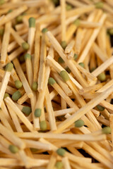 scattered matches without matchboxes on the table, a large number of wooden matches scattered in a...