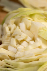 pieces of sliced white cabbage , details of fresh cabbage chopped into small pieces for convenience of cooking