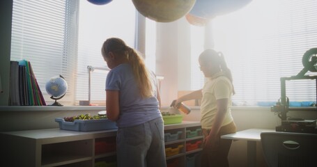Elementary School Students Growing Experimental Microgreens, Using Magnifying Glass, Spraying...