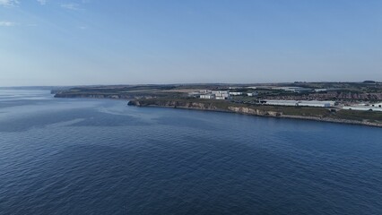 Aerial birds eye view drone shot Seaham County Durham north England UK seaside town coast sunny...