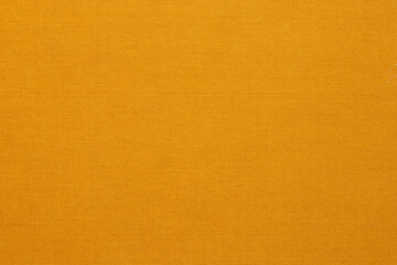 Orange fine weave fabric close-up for background for textures or wallpapers, book cover