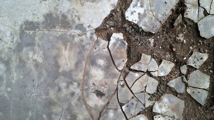Old grunge concrete surface with weathered cement texture and rough stone patterns, ideal for...