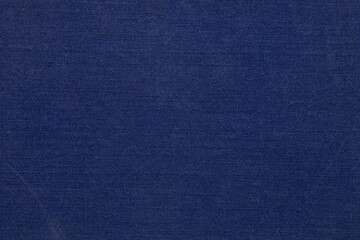 Dark blue fabric book as background and texture for design