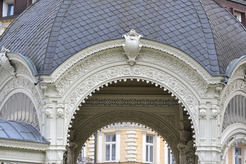  a detailed close-up of a decorative dome or archway, likely part of an historical building. 