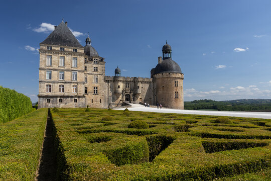 PERIGUEUX, FRANCE, 15 JULY 2025: Exterior view of Ch&acirc;teau de Hautefort a 17th century stately home in the Dordogne. Surrounded by a French topiary garden it is a popular tourist attraction. Copy space