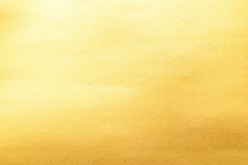 Gold background foil golden leaf metallic texture gradient light shiny reflective wrapping paper bright yellow solid color wallpaper for design decoration element backdrop