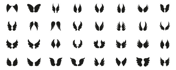 Angel and Fantasy Wings Solid Icon Set. Collection of Symmetrical Wing Shapes. Flight, Freedom, Power, and Fantasy Silhouette Symbol Collection. Isolated Vector Illustration
