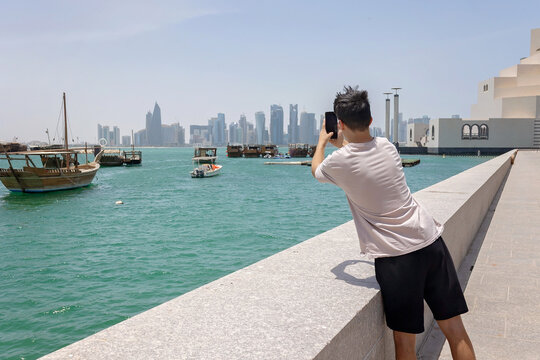Happy european family, visiting Doha during the hot summer months