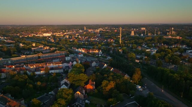 Aerial drone view of Herne in North Rhine-Westphalia, Germany &ndash; urban cityscape with residential buildings, streets, and green areas captured from above on a clear day. 10 September 2024