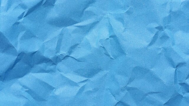 Stop motion animation of wrinkled textured blue paper background