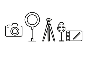 Obraz premium Various equipment for photography and content creation featuring a camera, ring light, tripod, microphone, and graphic tablet