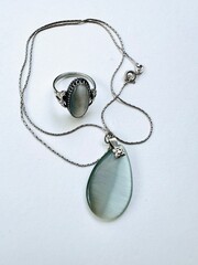 silver pendant with diamonds
