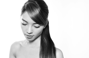 Fototapeta premium Beautiful asian woman with long dark and healthy hair and clear skin