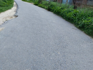 Winding Paved Road in village of india