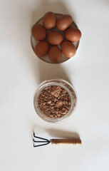 Eggs Cocoa Powder and Garden Tool A Recipe for Growth