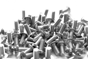 Stainless steel button head allen bolt. Socket button head cap screw on the table.