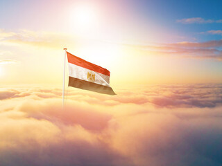 Egypt national flag aerial view clouds in beautiful sky. Top view. Drone. Aerial bird's eye fly...