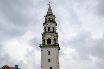 Naklejka premium The image shows an old tower that leans like the Tower of Pisa