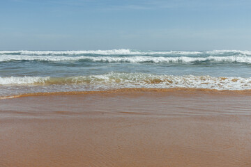 Waves Wash Up The Seashore