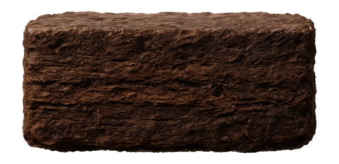 Peat block with compact, layered structure and earthy brown coloration