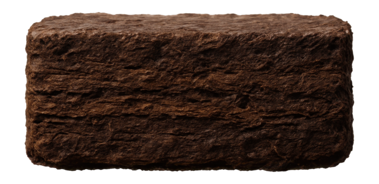 Peat block with compact, layered structure and earthy brown coloration