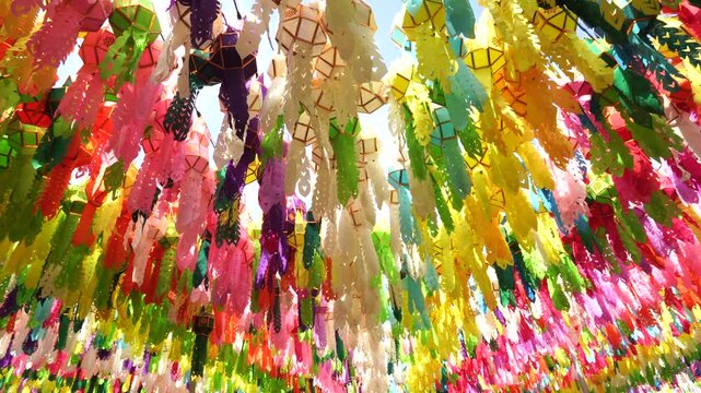Many hanging paper lanterns are seen celebrating the Yi Peng or Loi Krathong festival in northern Thailand.