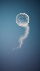 Ok Gradient background featuring a dissolving sphere turning to dust