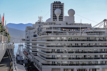 Modern luxury cruiseship cruise ship liner Koningsdam, Nieuw Statendam or Rotterdam at terminal in...