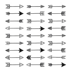Naklejka premium Hand-drawn arrow set featuring various directions and styles.