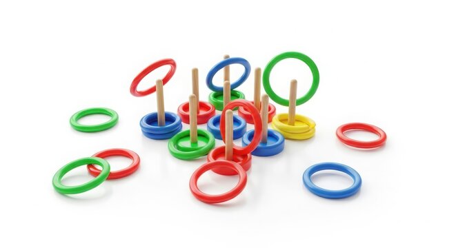 Colorful ring toss game with wooden pegs isolated on white background