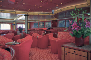 Classic show entertainment lounge onboard small cruiseship cruise ship liner with dancefloor, movie...